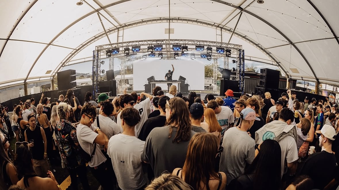 Wide festival crowd watching Joey iLLah on the main stage